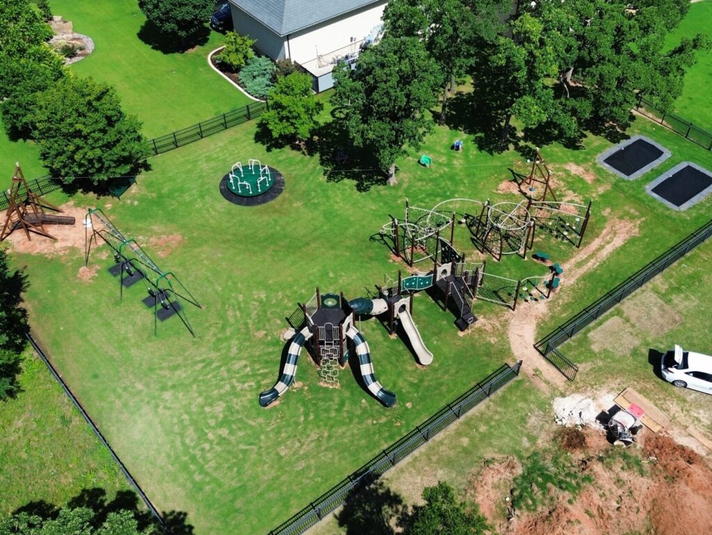 Commercial playground equipment creates park like setting