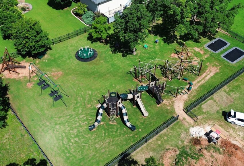 Commercial playground equipment creates park like setting