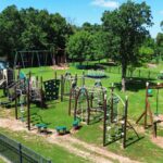 Commercial playground creates park like setting
